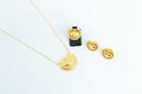 نصف طقم ذهب الرمش مطعم بالولو الابيض عيار 21 وزن 6...