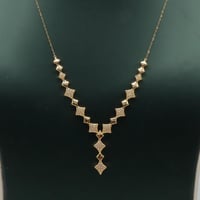 طقم ذهب تصميم الماسي عيار 18 وزن 6.2 جرام