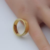 دبلة كارتير ذهب عيار 18 بتصميم اللوف العريض وزن 2....