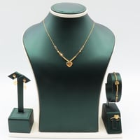 طقم ذهب صافي عيار 18 – تصميم قلب ناعم بوزن 5.47 جر...