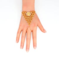 كف ذهب المنثورة عيار 21 بتصميم حبة الجنية بوزن 15....