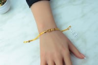 اسوارة ذهب عيار 21 تصميم الCD بنقش القوتشي