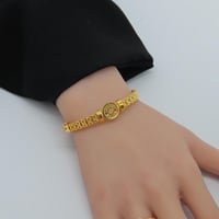 اسوارة مع خاتم ذهب عيار 21 بتصميم الجنية وزن 14.17...