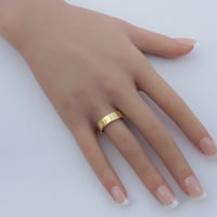 دبلة كارتير ذهب عيار 18 بتصميم اللوف العريض وزن 2....