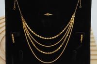 طقم ذهب اربعة دور عيار 21 وزن 12.2 جرام