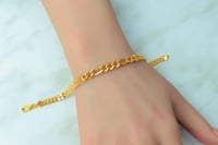 اسوارة جنزير ذهب عيار 21 بتصميم حبات الزيتون