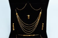 طقم ذهب الشلال خمسة دور عيار 21