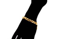 سوارة ذهب غصن الزيتون بتصميم الجنزير عيار 21 وزن 9...