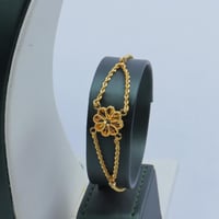 طقم ذهب عيار 21 دورين بتصميم ورد عصرى وزن 19.28 جر...