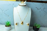 طقم ذهب البوتيقاء عيار 21 بدون اسواره بتصميم الماس...