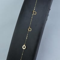 اسوارة ذهب بتفاصيل نواعم رقيقة عيار 18 وزن 0.3 جرا...