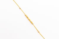 سوارة ذهب تصميم كرات الدوريكاء عيار 21 وزن 4.5 جرا...