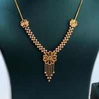 طقم ذهب الوردة بتصميم كرات الدوريكاء عيار 21 وزن 1...