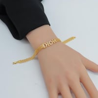 اسوارة ذهب ايطالي عيار 21 بتصميم ديور الماسي وزن 7...