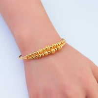 اسوارة ذهب بتفاصيل كروية أنيقة عيار 21 وزن 6.97 جر...