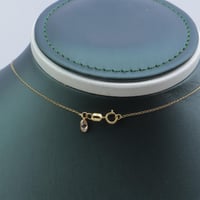 تعليقة ذهب عيار 18 مفتاح الألماس وزن 3.74 جرام