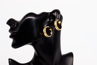 حلق ذهب تصميم فرزاتشي ذهب صافي عيار 18 وزن 3.5 جرا...