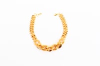 سوارة ذهب غصن الزيتون بتصميم الجنزير عيار 21 وزن 1...