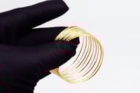 اسوارة ذهب عريضة عيار 18 بتصميم ايطالي وزن 21.9 جر...