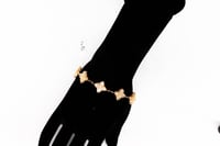 سوارة روبيرتو كوين خمس وردات عيار 21