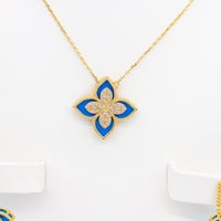 طقم روبيرتو كوين عيار 18 وزن 14.4 جرام