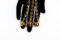 كف ذهب خليجي عيار 21 بتصميم سبيكة الوردة بوزن 27.9...