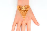 كف ذهب المنثورة عيار 21 بتصميم حبة الجنية بوزن 15....