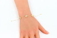 سوارة الفان كليف ثلاث وردات عيار 18 وزن 1.9 جرام