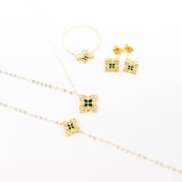 طقم روبيرتو كوين باللون الزيتي عيار 18