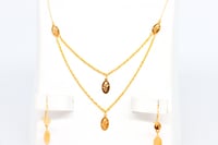 طقم ذهب سبيكة بيضاوي عيار 21