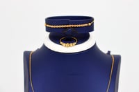 طقم ذهب المبروم عيار 21