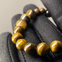 اسوارة من حجر عين النمر الطبيعي