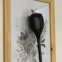 مصباح يحاكي الشعلة بالطاقة الشمسية