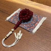 سبحة بكلايت احمر شفاف