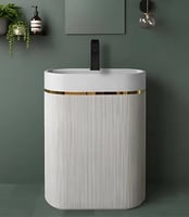 مغسلة قائمة بلون أبيض ناصع وتفاصيل ذهبية