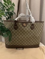 شنطة قوتشي حجم كبير بسحاب ومع محفظة