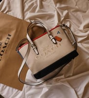 شنطة كوتش هاي كوالتي الحجم موضح بالصور