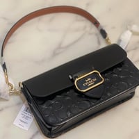 شنطة كوتش هاي كوالتي لون أسود لامع حجم وسط