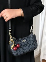 شنط كوتش مع ميدلية الكرزة