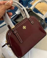 شنطة توري بورش عنابي لامع هاي كوالتي الحجم الوسط