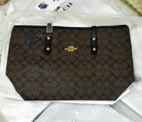 شنطة كوتش حجم وسط لون بيج