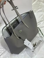 شنط لاكوست حجمين يتوفر العديد من الالوان