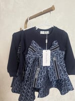 فستان ديور مزين بفيونكة كبيرة