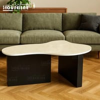 طاولة وسط عضوية سطح بيج رخامي وقاعدة MDF أسود تصمي...