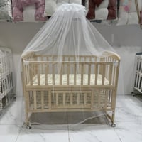 مهد السكون الذهبي – فخامة طبيعية لراحة المولود