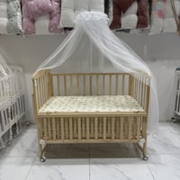 مهد السكون الذهبي – فخامة طبيعية لراحة المولود