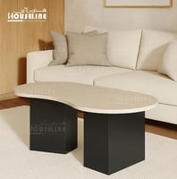 طاولة قهوة بيج بتصميم منحني – مودرن بلمسة فنية