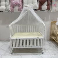 مهد الهدوء السماوي – فخامة نقية لراحة المولود