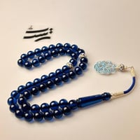 سبحة بكلايت لون أزرق شفاف - طربزون وفواصل فضة عيار...