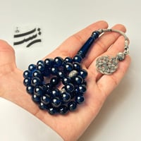 سبحة بكلايت لون أزرق شفاف- طربزون وفواصل فضة عيار...